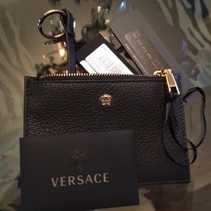 Gold Medusa. Black leather zip wallet w/key ring.